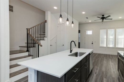 interior kitchen and stairwell of towhome