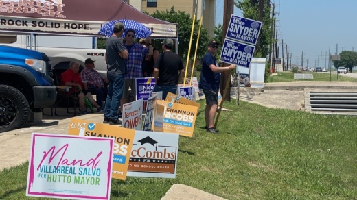 Candidates for school board and City Council made appearances at polling locations May 7. (Brian Rash/Community Impact Newspaper)
