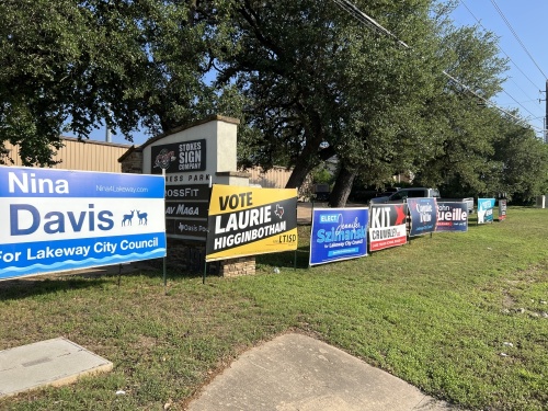 Candidates' signs line RM 620 on May 7. (Jennifer Schaefer/Community Impact Newspaper)