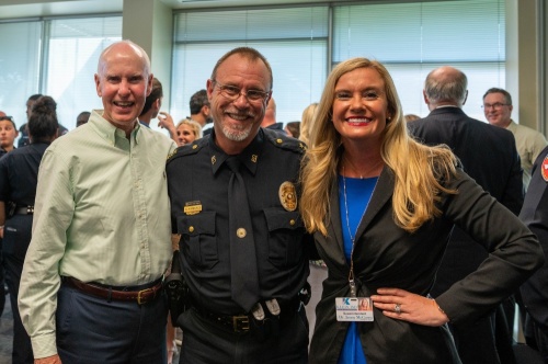 Klein ISD Police Chief David Kimberly (center) stands with KISD Superintendent Jenny McGown (right) and former Superintendent Jim Cain (left) at Kimberly's retirement party. (Courtesy Klein ISD)