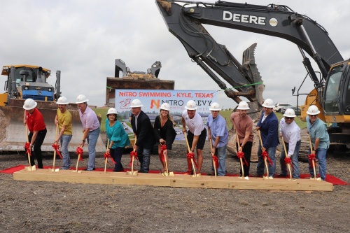 City of Kyle, HB Construction and Nitro Swim leadership broke ground May 10 on the fourth Nitro Swim facility, which will be located in Kyle. (Zara Flores/Community Impact Newspaper)
