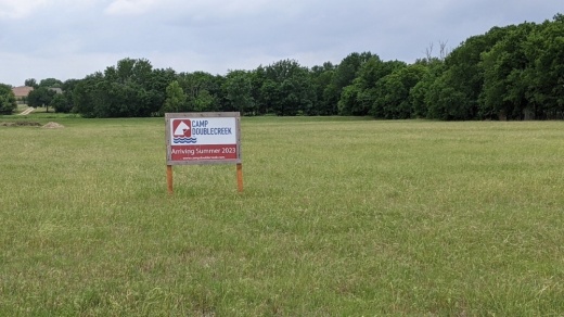 Camp Doublecreek "coming soon" sign
