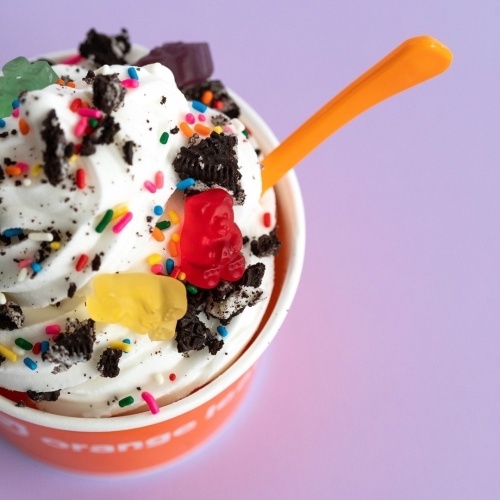 The renovated location now includes a self-serve candy wall, cotton candy, popcorn and more options for visitors to the shop. (Courtesy Orange Leaf Frozen Yogurt)