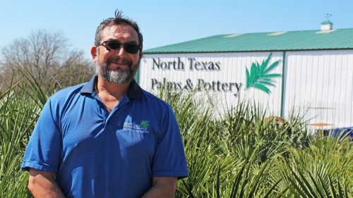 Leo Yruegas has a background working in the landscape industry and owns North Texas Palms & Pottery. (Karen Chaney/Community Impact Newspaper)