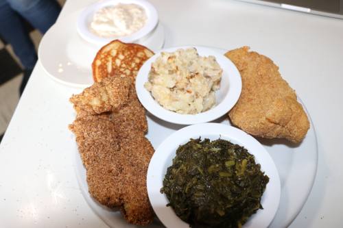 (SIDEBAR) This is the catfish meat and two combo with baked potato casserole, turnip greens, cornbread, and housemade tartar sauce. ($13.95)