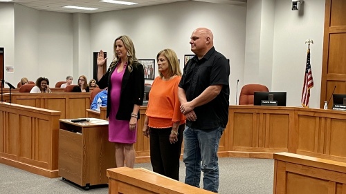 From left, Amanda Kuhn, Nanette Weimer and Lance Botkin were sworn in as Pearland ISD board members on May 17. (Andy Yanez/Community Impact Newspaper)