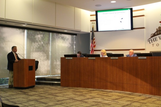 Chris Nunes, The Woodlands’ chief operating officer, updates the board of directors about a connector path to Harper's Landing. (Andrew Christman/Community Impact Newspaper)