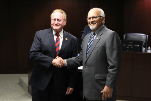 Montgomery County Judge Mark Keough (left) officiated the swearing in of John Escoto (right) as Shenandoah's mayor May 25. (Andrew Christman/Community Impact Newspaper)