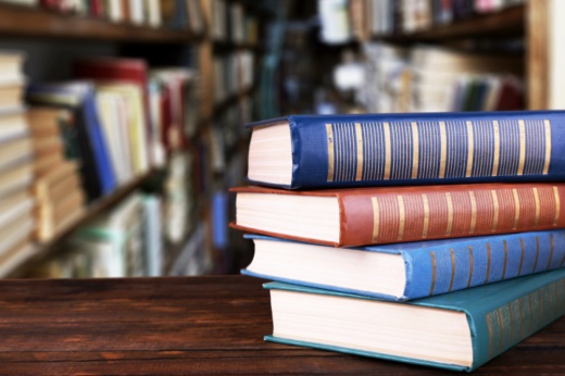 library books in a stack on a table