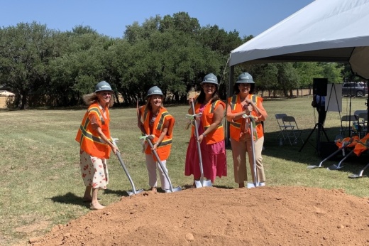 people with shovels at groundbreaking