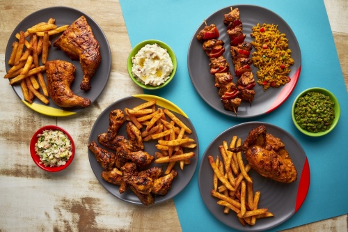 Different dishes from South African-based Nando's are photographed from above