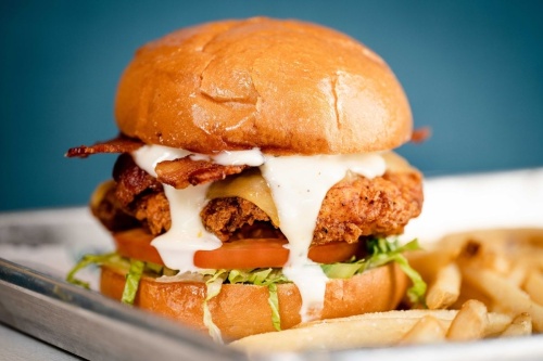 Birdcall's deluxe chicken sandwich features its all-natural crispy chicken, bacon, pepper jack cheese, tomato, lettuce and buttermilk herb mayo, according to its website. (Courtesy Birdcall)