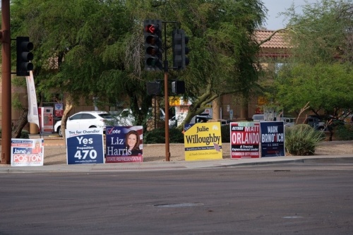 Political signs line most street corners in Chandler. (Katelyn Reinhart/Community Impact Newspaper)