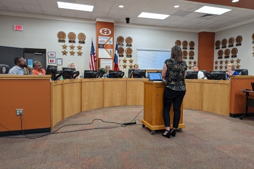 Photo of Meredith Roddy speaking to Hutto ISD trustees