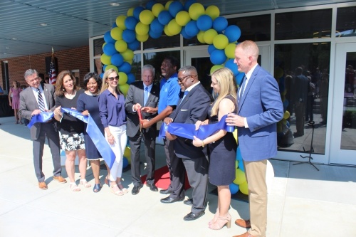 Members of the Franklin Special School District board cut the ribbon on a new performing arts center on May 20. (Photos by Martin Cassidy/Community Impact Newspaper)
