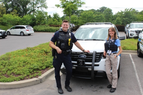 On the left, Murfreesboro Police Department Officer Quentin Peeler, with Heather Noulis, a forensic mental health counselor, work together as MPD's mental health co-responder team. (Martin Cassidy/Community Impact Newspaper)  