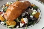 One entree salad features miso glazed cedar plank salmon over mixed greens, a variety of vegetables, goat cheese, mandarin oranges and sliced pecans all tossed in a ginger-lime vinaigrette. ($16.95)
Alternative (name with price): Cedar Plank Salmon Salad ($16.95)