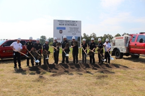 Members of the Tomball Fire Department and Chief Joe Sykora (far right) break ground on Station No. 4 on June 27. (Anna Lotz/Community Impact Newspaper)