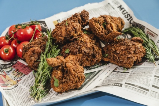 Fried chicken in newspaper