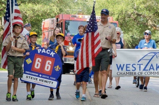 children walking in fourth of july parade