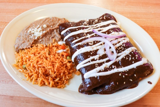 The N'Chiladas menu makes it easy to customize the meals to suit any flavor palate or hunger level with varying sizes of plates, co-owner Edson Marquez said. (Photos by Zara Flores/Community Impact Newspaper)