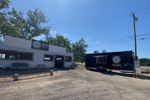 Ambur Fire resumed slinging smash burgers and barbecue May 5 after suffering tornado damage in March. (Brooke Sjoberg/Community Impact Newspaper)