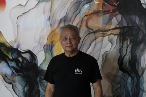 John Hu is the owner of Hu’s Cooking. (George Wiebe/Community Impact Newspaper)