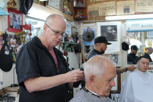 Jeff Armstong first joined Doug’s Barber Shop in 2002. He returned in 2012 and eventually became its owner in 2014. (Shawn Arrajj/Community Impact Newspaper)