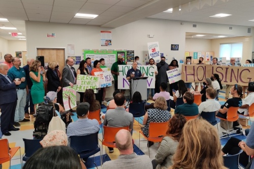City officials, candidates and housing activists gathered in Mueller July 21 for a rally in support of the bond proposal. (Ben Thompson/Community Impact Newspaper)