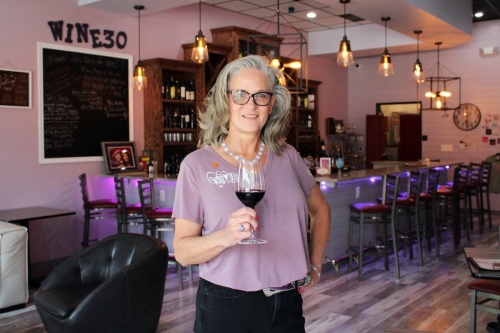 Annett Van Grinsven co-owns Wine:30 on Oak Street with her significant other, Tim Hamilton. They opened the wine bar in July 2021 at 400 S. Oak St. in Roanoke. (Karen Chaney/Community Impact Newspaper)