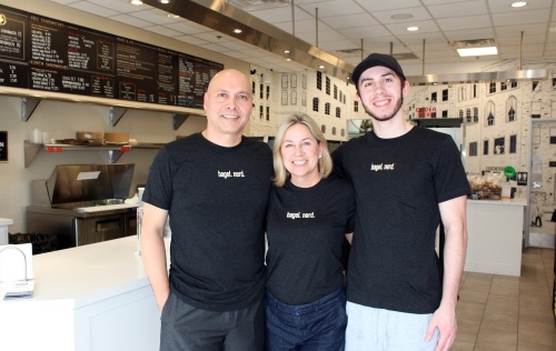 Owners Dan and Jennifer Hilbert work with Assistant Manager Ethan Grant, right, at Dan’s Bagels. (Karen Chaney/Community Impact Newspaper)