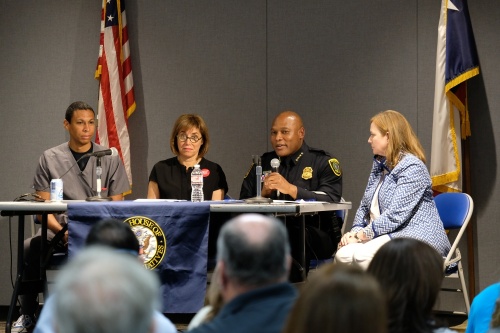 From left, Cedric Dark, Norri Leder, Troy Finner and Lizzie Fletcher participate in a gun safety town hall at Bayland Community Center. (George Wiebe/Community Impact Newspaper)