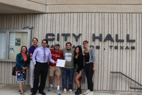grassroots organizers standing in front of San Marcos City Hall