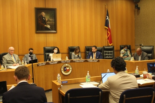 Photo of Harris County commissioners sit at the dais