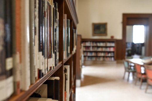 a shelf with library books