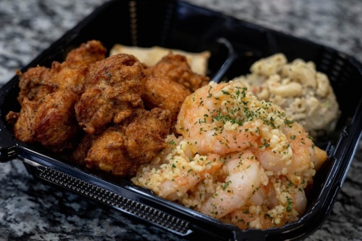 Aloha serves a variety of Hawaiian-style rice dishes, including a surf and turf plate, a Spam hand roll and a coconut shrimp plate. (Courtesy Aloha Chicken and Shrimp)