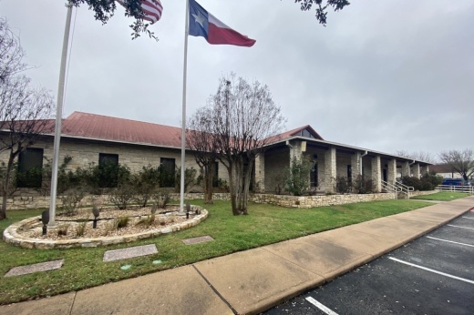 exterior shot of small police building