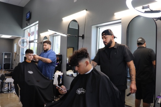 The team at Hays County Barbershop specializes in a variety of hair and beard services. (Zara Flores/Community Impact Newspaper)