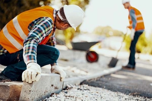 Transportation projects in The Woodlands area include bridge construction on Gosling Road. (Courtesy Adobe Stock)