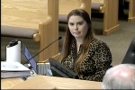 Montgomery County budget officer Amanda Carter, a woman with red hair and in a leopard-print shirt