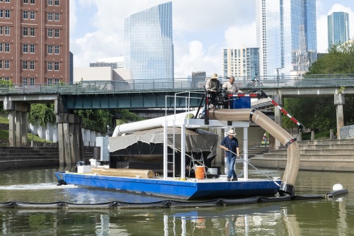 A local nonprofit dedicated to preserving Buffalo Bayou and maintaining the waterway's health announced Aug. 3 the addition of a new vacuum-powered boat to its cleanup arsenal. (Courtesy Buffalo Bayou Partnership)
