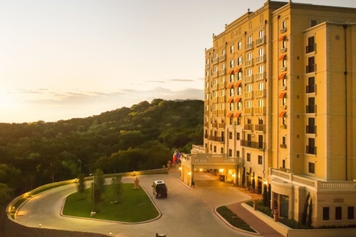 exterior shot of large hotel at sunset