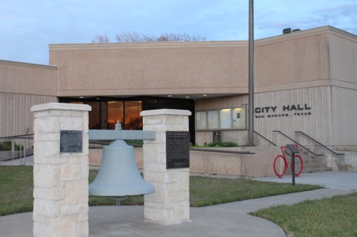 The memorial bell in front of San Marcos City Hall.