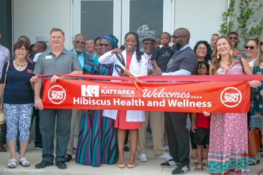 Dr. Jacinta Anyaoku is joined by the Katy Area Chamber of Commerce at the Aug. 4 ribbon-cutting ceremony for Hibiscus Health and Wellness, a direct primary care clinic that also offers aesthetic treatments. (Courtesy Hibiscus Health and Wellness)