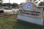 A brick sign labeled "Lone Star Groundwater Conservation District"