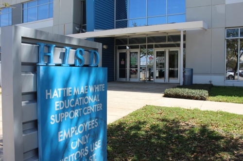 Photo of a Houston ISD sign and building