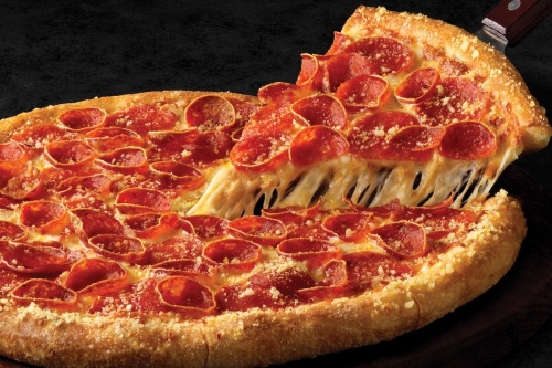pepperoni pizza with black background