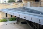 A close up of the Austin City Hall building.