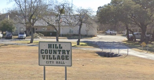 According to Hill Country Village officials, most attendees of three recent town halls said they prefer replacing the 42-year-old current City Hall complex at 116 Aspen Lane with a larger, modern municipal facility on the same site. The city plans to wait until spring 2023 to see about possibly calling a May bond vote to support a City Hall project. (Courtesy Google Streets)