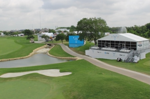 Golf course with seating overlooking the green.